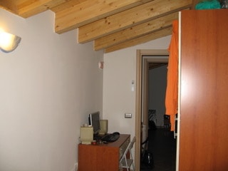Stanze affitto studenti Verona Borgo Roma stanza singola stanza da letto con soffitto con travi a vista
